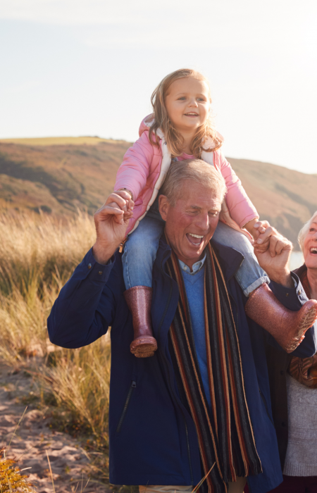 Heart Health Image Heart Health Image Alt Text - Elderly Grandparents on a walk with young granddaughter.