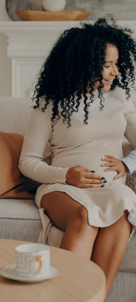 Female Hormonal Health Female Hormonal Health alt - Pregnant mother with a toddler