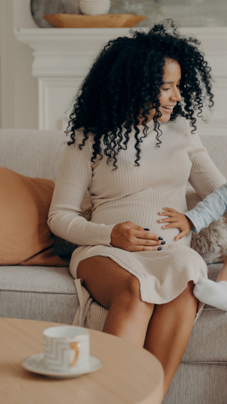 Female Hormonal Health alt - Pregnant mother with a toddler