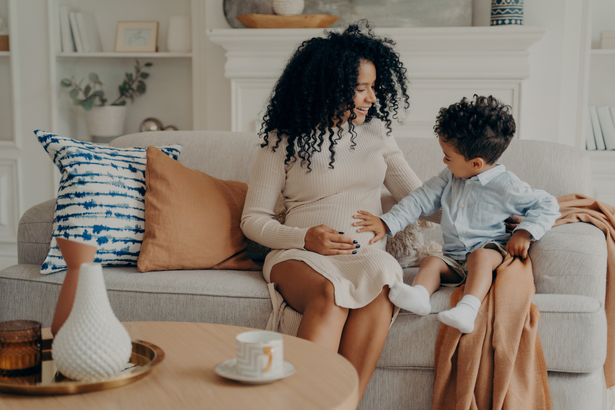 Female Hormonal Health alt - Pregnant mother with a toddler